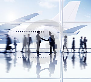 Silhouettes of Business People in the Airport