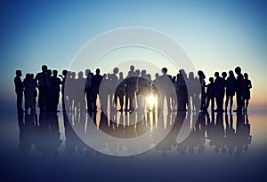 Silhouettes of Business People Gathering Outdoors