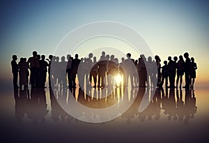 Silhouettes of Business People Gathering Outdoors photo