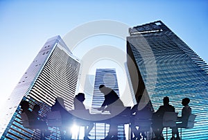 Silhouettes of Business People Meeting Outdoors