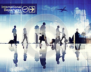 Silhouettes of Business People Walking in an Airport