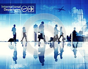 Silhouettes of Business People Walking in an Airport