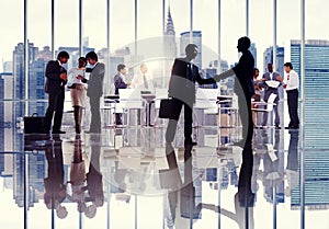 Silhouettes of Business People Working in an Office Building