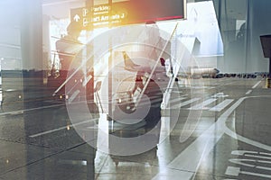 Silhouettes of businessman at the airport who waits for boarding. Double exposure