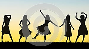 Silhouettes of carefree girls have a spirited and carefree time
