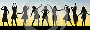 Silhouettes of Carefree Girls Having Fun