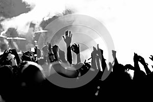 Silhouettes of concert crowd