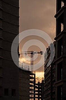 Silhouettes of Construction at Sunset