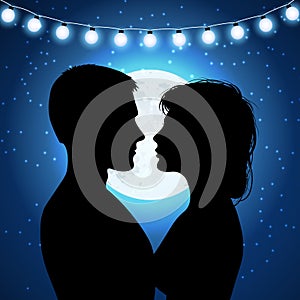 Silhouettes of couple on the moonlight background