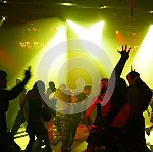 Silhouettes of a dancing teenagers