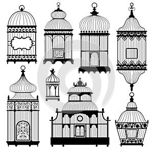 Silhouettes of a decorative vintage bird cages. Set of vector silhouettes on white background