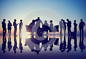 Silhouettes of Diverse Business People with Different Activities photo