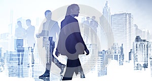 Silhouettes of diverse business people rushing and looking for solutions in abstract office space with skyscraper city view.