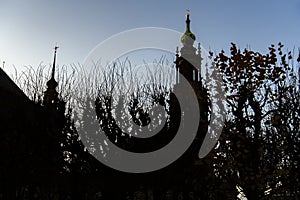 Silhouettes of Dresden Cathedral of Trinity Hofkirche and Dresden Castle Hausmannsturm. Dresden, Germany. November 2019