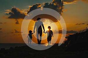 Silhouettes of a family on a trip, bonding under sunset