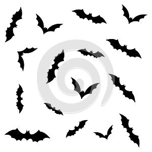 Silhouettes of flying bats isolated on white background