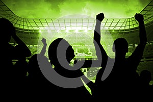 Silhouettes of football supporters photo