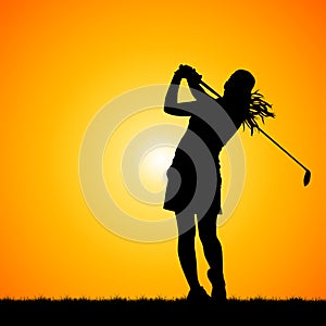 Silhouettes golfer with sunset background