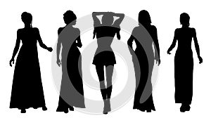 Silhouettes of a group of girls in dresses