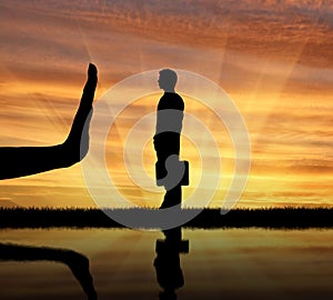 Silhouettes of hands stops a man