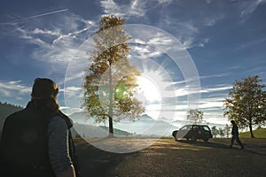 Silhouettes of Hikers and a Swiss Alp Panorama