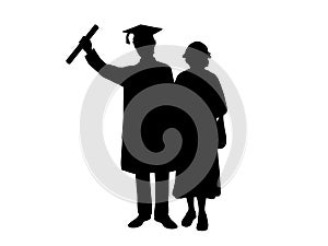 Silhouettes of male graduate hugs grandmother