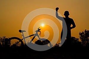 Silhouettes of mountain bike with man