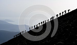 Mountaineers hiking uphill