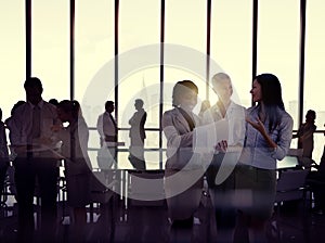 Silhouettes Of Multi-Ethnic Group Of Business People