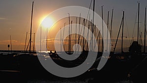 Silhouettes of Parked Pleasure Yachts at Sunset in Port on Lake of Geneva, Montreux, Switzerland