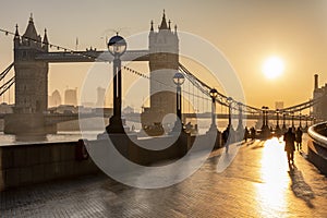 Silhouettes of people going to their work in London, UK