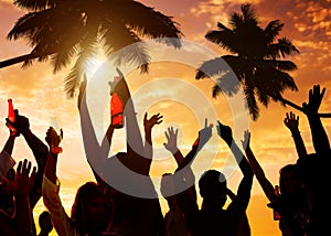 Silhouettes of People Partying on the Beach