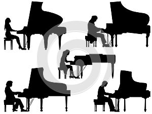 Silhouettes pianist at the piano. photo