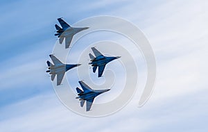 Silhouettes of russian fighter aircrafts in the sky