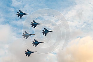 Silhouettes of russian fighter aircrafts SU-27 in