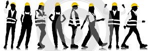 Silhouettes set of female workers with helmets. Full length view