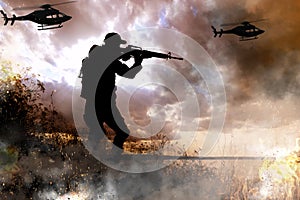 Silhouettes of soldier and helicopters in combat zone. Military