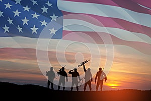 Silhouettes of soldiers on background of USA flag. Greeting card for Veterans Day, Memorial Day, Independence Day.