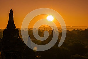 Silhouettes of the Temple ruins at the sunrise hours in Bagan, Myanmar