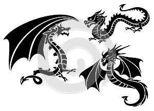 Silhouettes of three dragons