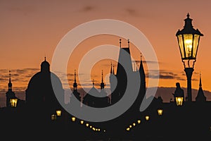 Silhouettes of towers and spires during sunrise in Prague, Czeck Republic
