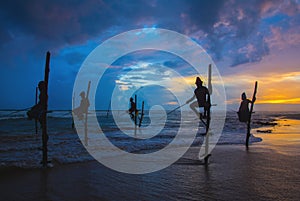 Silhouettes of the traditional Sri Lankan stilt fishermen