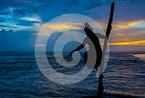 Silhouettes of the traditional Sri Lankan stilt fishermen