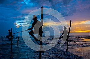 Silhouettes of the traditional Sri Lankan stilt fishermen