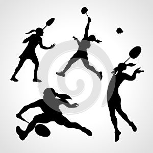 Silhouettes of women professional badminton players. Vector set