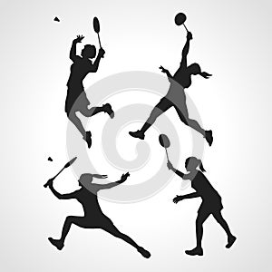 Silhouettes of women professional badminton players. Vector set