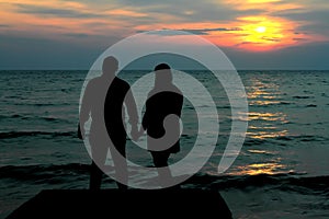 The silhoutte of couple at jetty