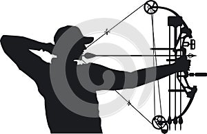 Silhuete of hunter aiming with compound bow photo