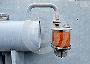 The silica Gel Breather contains orange silica gel attach to the conservator tank