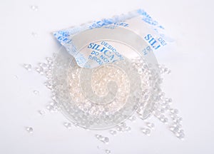 Silicagel pellets and bag on white background